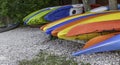 Colorful kayaks for rent at a beach at a lake