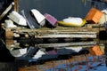 Several Colorful Row Boats on a Wooden Dock Royalty Free Stock Photo