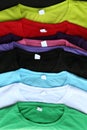 Several colorful t-shirts