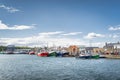 Several colourful fishing boats moored in Howth harbour, Dublin, Ireland Royalty Free Stock Photo