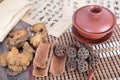 Several common Chinese herbal medicines and a purple sand medicine bowl and prescription