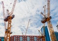 Several construction cranes in city in Montreal, Quebec, Canada