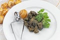 Cooked Burgundy snails in white plate Royalty Free Stock Photo