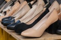Mixed High heel shoes black color and creme color