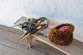 Several daggers on a bench near a Cossack hat