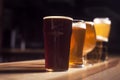 Several different beers are standing in a row Royalty Free Stock Photo