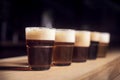 Several different beers are standing in a row Royalty Free Stock Photo