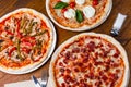 Several different pizzas