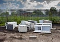 Several discarded fly-tipped fridges and freezers. Royalty Free Stock Photo