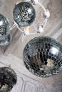 Several disco balls hanging under the ceiling - party decoration Royalty Free Stock Photo