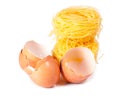 Several eggs and pasta on a white Royalty Free Stock Photo