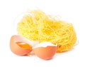 Several eggs and pasta on a white Royalty Free Stock Photo
