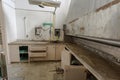 Several empty cabinets and drawers left abandoned in an empty factory