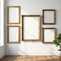 Several empty gilded frames against a stark white wall, texture, frame