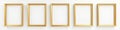 Several empty golden picture frames on a bright white wall , frame, golden, gold frames