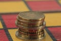 Several EUR coins lie on the chessboard