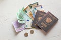 Euro banknotes,some coins and passports. Preps to the vocation o