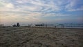 several fishing boats parked around the beach view rembang