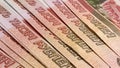 Several five-thousand-dollar bills lie in a fan. Banknotes of 5000 rubles. Cash banknotes. Background of cash ruble notes.