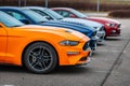 Several Ford Mustang sports cars outside in the parking lot Royalty Free Stock Photo