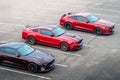 Several Ford Mustang sports cars outside in the parking lot Royalty Free Stock Photo