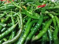 several fresh green chilies