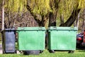 .Several garbage cans in the park