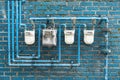Several gas meters located on the wall of a residential building Royalty Free Stock Photo