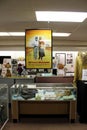 Long glass cases holding items from the Wizard of Oz, All Things Oz Museum, Chittenango, New York, 2018