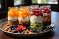 Several glasses with an appetizing parfait for a nutritious snack or breakfast