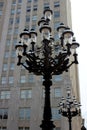 Several old fashioned gaslight lamps on busy city streets, St. Louis, Mo, 2019