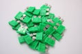 Several green car fuses Royalty Free Stock Photo