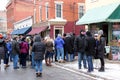 Groups of people dressed for Winter, enjoying Chowderfest, Saratoga Springs, New York, 2019