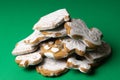 Several handmade cookies in the shape of glaze in the shape of Christmas toys