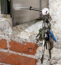 Several hanging keys and a steel safe Royalty Free Stock Photo