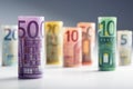 Several hundred euro banknotes stacked by value. Euro money concept. Rolls Euro banknotes. Euro currency.