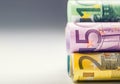 Several hundred euro banknotes stacked by value. Euro money concept. Rolls Euro banknotes. Euro currency. Royalty Free Stock Photo