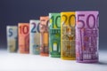 Several hundred euro banknotes stacked by value. Euro money concept. Rolls Euro banknotes. Euro currency. Royalty Free Stock Photo