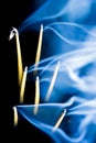 Several incense sticks in front of black background Royalty Free Stock Photo