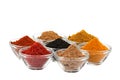 Several indian spices in glass bowls bowl Royalty Free Stock Photo