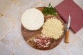 Ingredients for cooking croziflette with reblochon