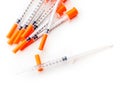 Several insulin syringes for for injection white isolated background