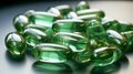 Several isolated green medical capsules lie on a light glossy surface