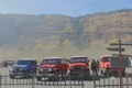 several jeeps were parked waiting for the arrival of the tourists