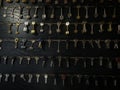 Several Keys type such as household and car key use for copying or duplicating hang on the wall in the locksmith workshop. Many va