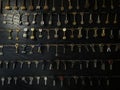 Several Keys type such as household and car key use for copying or duplicating hang on the wall in the locksmith workshop. Many va Royalty Free Stock Photo