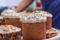 Several Kulich, a traditional Russian Easter bread, with meringue and colorful sprinkles Royalty Free Stock Photo