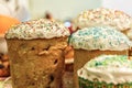 Several Kulich, a traditional Russian Easter bread, with meringue and colorful sprinkles Royalty Free Stock Photo