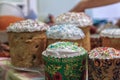 Several Kulich, a traditional Russian Easter bread, with meringue and colorful sprinkles Royalty Free Stock Photo