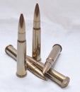 Large caliber rifle bullets on a white background Royalty Free Stock Photo